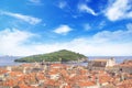 Beautiful view of the bell tower and the island Lokrum in the old town of Dubrovnik, Croatia Royalty Free Stock Photo