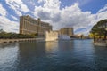 Beautiful view of the Bellagio casino hotel fountains on a sunny day against the backdrop of a blue sky with white clouds. Royalty Free Stock Photo