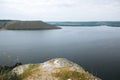 Beautiful view on big lake among hills. River and cliffs landscape. Bakota lake and Dnister river in Ukraine. Travelling and