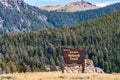 Beautiful view of the Bighorn National forest with a sign in Sheridan, Wyoming.