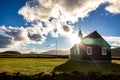 Beautiful view of a black wooden church in Budir, Iceland