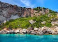 Beautiful view on rock arces arches of Blue caves from sightseeing boat with tourists in blue water of Ionian Sea inside cave, Isl Royalty Free Stock Photo