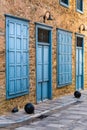 Beautiful view of blue windows and doors at the street Royalty Free Stock Photo