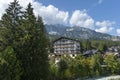 Beautiful view of the Boite river, residential district and mountain in Cortina d`Ampezzo, Dolomiti mountains, Alps, Veneto