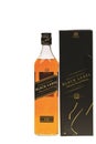 Beautiful view of bottle of whisky with box Johnnie Walker Black Label isolated on white background. Alcohol concept. Royalty Free Stock Photo