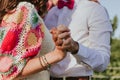 Beautiful view of the Bride and Groom holding hands during the first dance Royalty Free Stock Photo