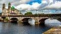 Beautiful view of the bridge over the river Shannon, the parish church of Ss. Peter and Paul in Athlone town Royalty Free Stock Photo