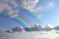 Beautiful view of bright rainbows in blue sky on sunny day