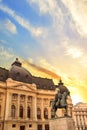 Beautiful view of the building of the Central University Library with equestrian monument to King Karol I in Bucharest, Romania Royalty Free Stock Photo