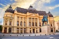 Beautiful view of the building of the Central University Library with equestrian monument to King Karol I in Bucharest, Romania Royalty Free Stock Photo