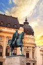 Beautiful view of the building of the Central University Library with equestrian monument to King Karol I in Bucharest, Romania Royalty Free Stock Photo