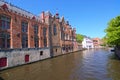 Beautiful view of the canal and traditional houses in the old town of Bruges dutch: Brugge, Belgium. Spring landscape photo Royalty Free Stock Photo