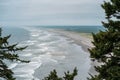 Beautiful view of Cape Disappointment State Park beach, framed by trees. Washington State Royalty Free Stock Photo