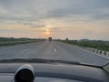 Road and weather view from car and sun shining