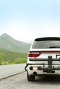 Beautiful view of car on roadside in mountains. Road trip Royalty Free Stock Photo