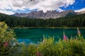 Beautiful view of Carezza karersee lake with Mount Latemar, Bolzano province, South tyrol, Italy