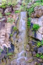 Beautiful view on cascading waterfall in cactus park of Las Palmas, Gran Canary, Spain Royalty Free Stock Photo