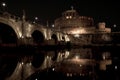 Beautiful view of Castel Sant`Angelo and the bridge at night with reflections on the Tiber river. Rome Italy Royalty Free Stock Photo