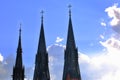 Beautiful view of cathedral tops on sunny blue sky and white clouds backgroound. Uppsala, Sweden. Beautiful backgrounds. Royalty Free Stock Photo