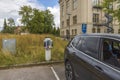 Beautiful view of charging station for electric car in  park city. Sweden. Royalty Free Stock Photo