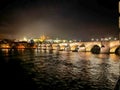 Beautiful view of the Charles Bridge at night in Prague, Czechia. Royalty Free Stock Photo
