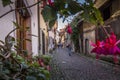 Beautiful view of charming street scene with colorful houses in the historic town of Eguisheim on an idyllic sunny day with blue Royalty Free Stock Photo