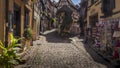 Beautiful view of charming street scene with colorful houses in the historic town of Eguisheim on an idyllic sunny day with blue Royalty Free Stock Photo