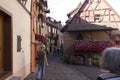 Beautiful view of charming street scene with colorful houses in the historic town of Eguisheim on an idyllic sunny day with blue Royalty Free Stock Photo