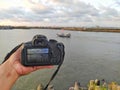 The beautiful view of Cilacap Indonesia from a DSLR camera with a seascape, fishing boats under the sky Royalty Free Stock Photo