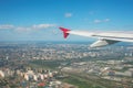 Beautiful view of the city when the plane takes off with the wing Royalty Free Stock Photo