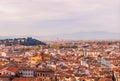 Beautiful view of city skyline, towers, basilicas, red-tiled roofs of houses and mountains, Florence, Italy