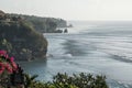 Beautiful view from the cliff to the blue ocean with lines of big waves for surfing in Bingin and Impossibles surf spot