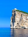 A beautiful view of the cliffs with the lighthouse Capo Caccia. Sardinia, Italy