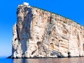 A beautiful view of the cliffs with the lighthouse Capo Caccia. Sardinia, Italy