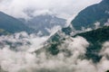 Beautiful view of clouds slowly rising in the morning in the mountains of Vietnam highlands