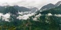 Beautiful view of clouds slowly rising in the morning in the mountains of Vietnam highlands