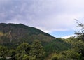 A Beautiful view of cloudy sky across the Mountains Royalty Free Stock Photo