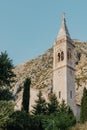 Beautiful view of the coast of Kotor Bay and St.Eustace& x27;s Church in the village Dobrota in Montenegro. Church of St Royalty Free Stock Photo