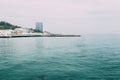 Beautiful view of the coast of Odesa. View from the sea to the beach, umbrellas and hotel Royalty Free Stock Photo