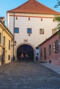 Beautiful view of cobbled street of Zagreb city and Stone gate with walking people, Croatia Royalty Free Stock Photo