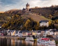 Beautiful view of Cochem Imperial castle and river cruise ships in Germany in summer