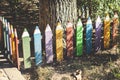 Beautiful view of colorful children garden fence in form of multicolored pencils. Royalty Free Stock Photo