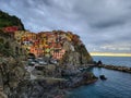 Beautiful view of the colorful coastal village of Cinque Terre, at the edge of the cliff Riomaggiore Royalty Free Stock Photo