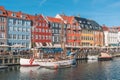 Beautiful view with colorful facade of traditional houses and old wooden ships along the Nyhavn Canal, Copenhagen, Denmark Royalty Free Stock Photo