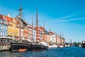 Beautiful view with colorful facade of traditional houses and old wooden ships along the Nyhavn Canal, Copenhagen, Denmark Royalty Free Stock Photo