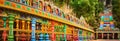 Colorful stairs of Batu caves, Malaysia. Panorama Royalty Free Stock Photo