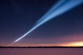 Beautiful view of a comet flying over a snowy field. Royalty Free Stock Photo