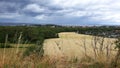 Beautiful view of the countryside with the yellow wheat field, south of Sweden. Royalty Free Stock Photo