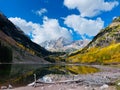 Beautiful view of Crater Lake Trail at Maroon Bells mountains with blue cloudy sky Royalty Free Stock Photo