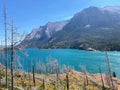 A beautiful view of the crystal clear turquoise waters of Saint Mary Lake below and the mountains in the backgroun Royalty Free Stock Photo